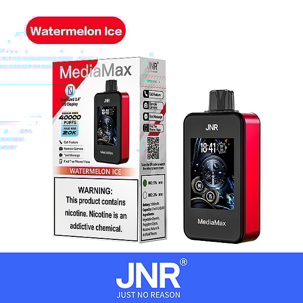 A vape device named "MediaMax" with a prominent "Watermelon Ice" label, featuring a black and red design and a large HD display showing time and battery status. The packaging includes a warning about nicotine being an addictive chemical and various product features.